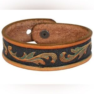 Justin Tooled Gold/Brown Leather Bracelet
With adjustable snap closure
